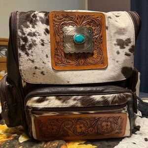 Genuine Hair On Cowhide & Tooled Leather Backpack/Diaper Bag